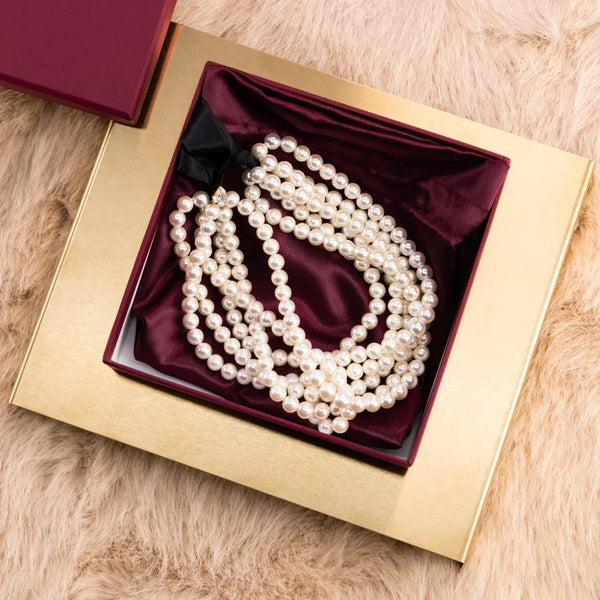 Чокер-трансформер з 6 рядів перлин білий