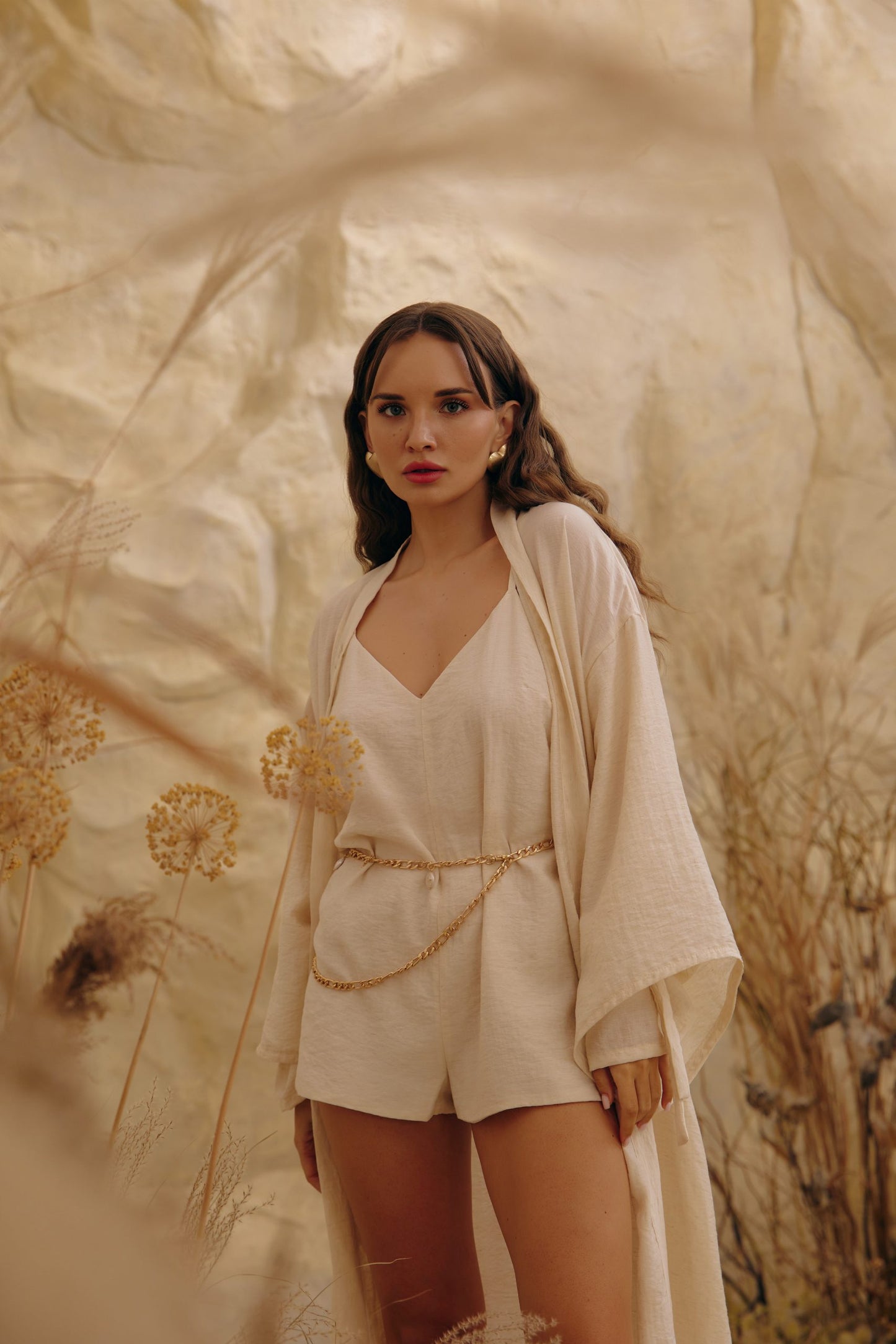 Лляний ромпер із вишивкою на спині