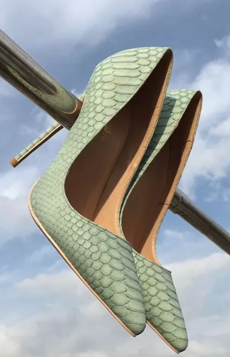 Mint reptile boat shoes